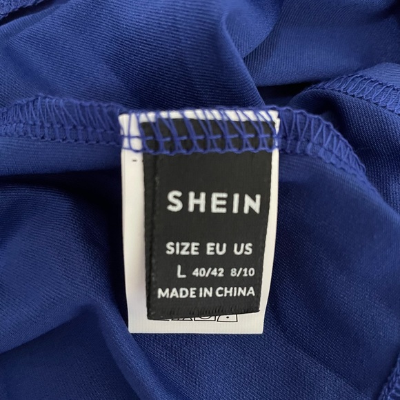 Blue deep cut body suite. Never worn. - Picture 4 of 6